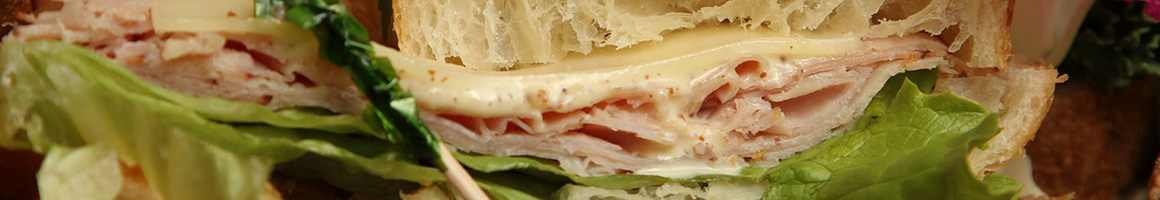 Eating Italian Pizza Sandwich at Guiseppe's Italian Restaurant restaurant in Petersburg, VA.